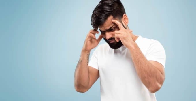 close up portrait young indian man white shirt concentrating suffering from headache 155003 23817