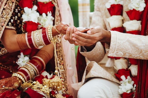 hands indian bride groom intertwined together making authentic wedding ritual 8353 10047