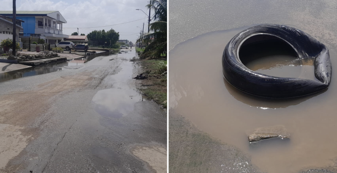 anamoestraat gat in weg straat paramaribo suriname onderwater